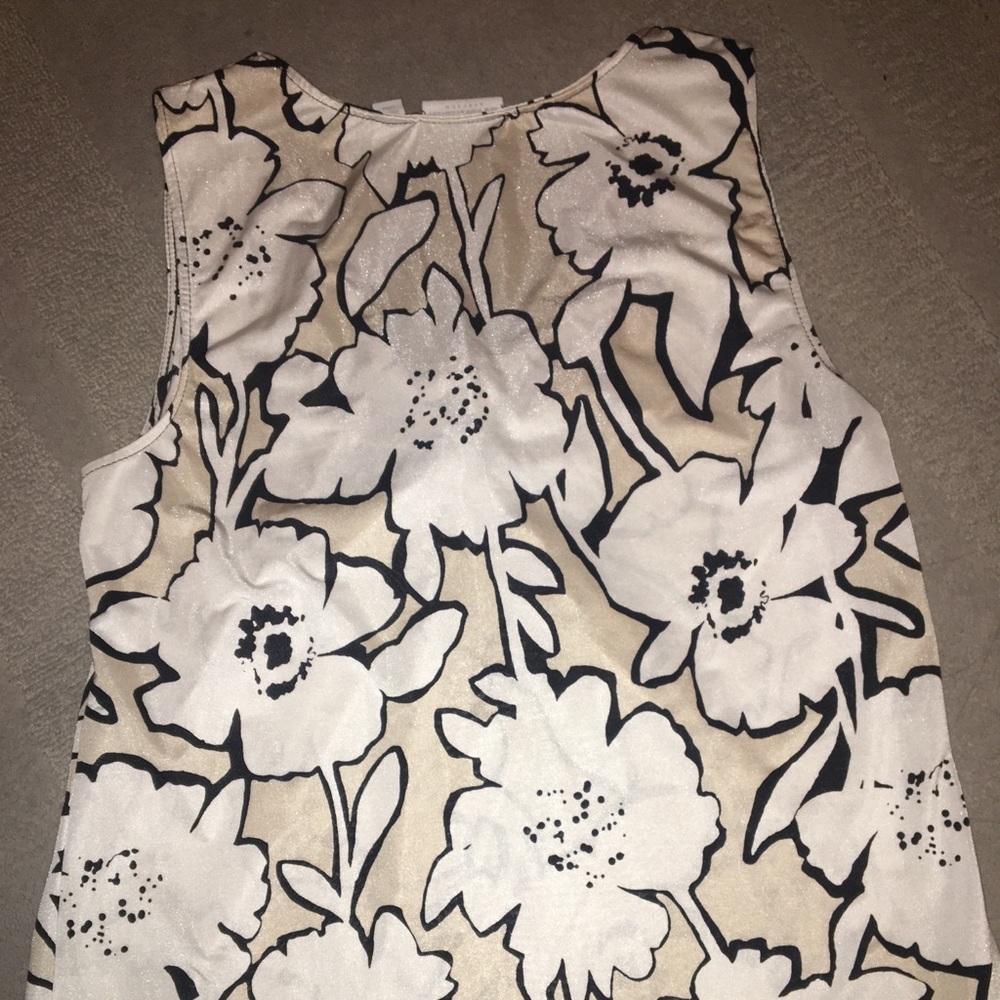 A pretty nylon slip over top with stylish print